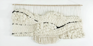 modern white macrame wall hanging