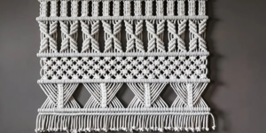 geometric white macrame wall hanging