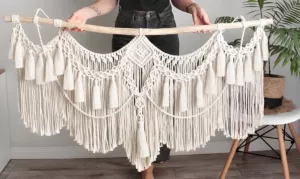 white macrame wall hanging dust removal