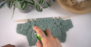 green macrame wall hanging cleaning